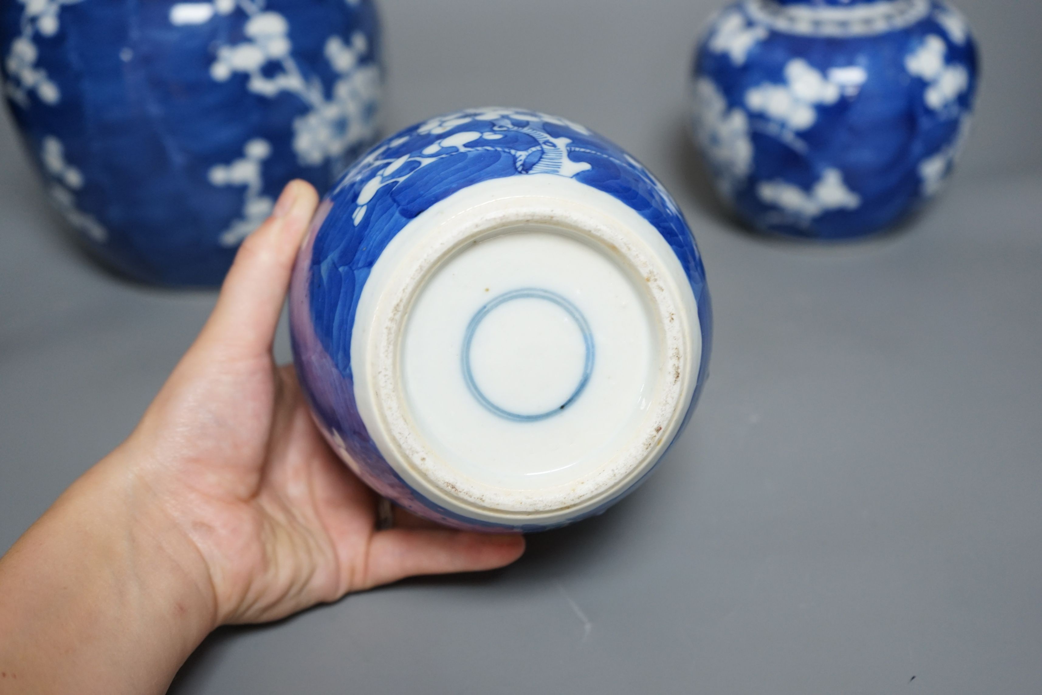 Three Chinese blue and white jars and covers, tallest 21cms high